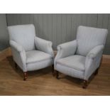 Pair of late Victorian Howard style scroll back armchairs