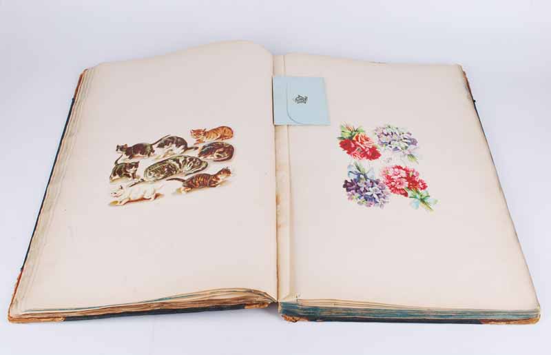 A Victorian scrapbook containing loose and fixed decoupage 30cm x 48cm - Image 3 of 4