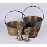 Three graduated hoop handle preserve pans, plus a seven pound and four pound weight (5)