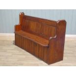 A Victorian pitch pine curved chapel pew 150cm