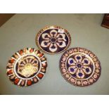 Two early 20th century Royal Crown Derby Imari pattern plates and a later 1128 example