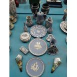 Fourteen items of Wedgwood blue Jasperware, 2 wall pockets and a Delft dish