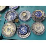 A mixed lot of blue and white plates, bowls, cups etc