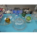 A collection of lead crystal and glass including: four glass fishing floats, a water ewer, large