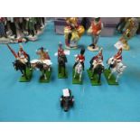 Six die cast Trooping The Colour models and a cannon