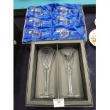 A pair of Waterford Crystal toasting flutes and a boxed set of Edinburgh crystal wine glasses