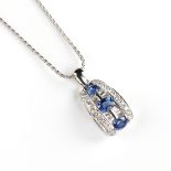 A DE HAGO STYLE 18K WHITE GOLD, DIAMOND, AND SAPPHIRE PENDANT WITH NECKLACE, 20TH CENTURY, a cascade