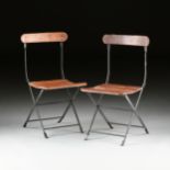 A PAIR OF ANGLO-INDIAN, TEAK AND IRON FOLDING CHAIRS, 20TH CENTURY, the curved tablet back over