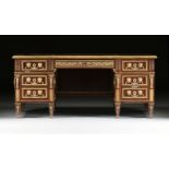 A LOUIS XVI STYLE ORMOLU MOUNTED MAHOGANY PEDESTAL DESK, 20TH CENTURY, the rectangular top with