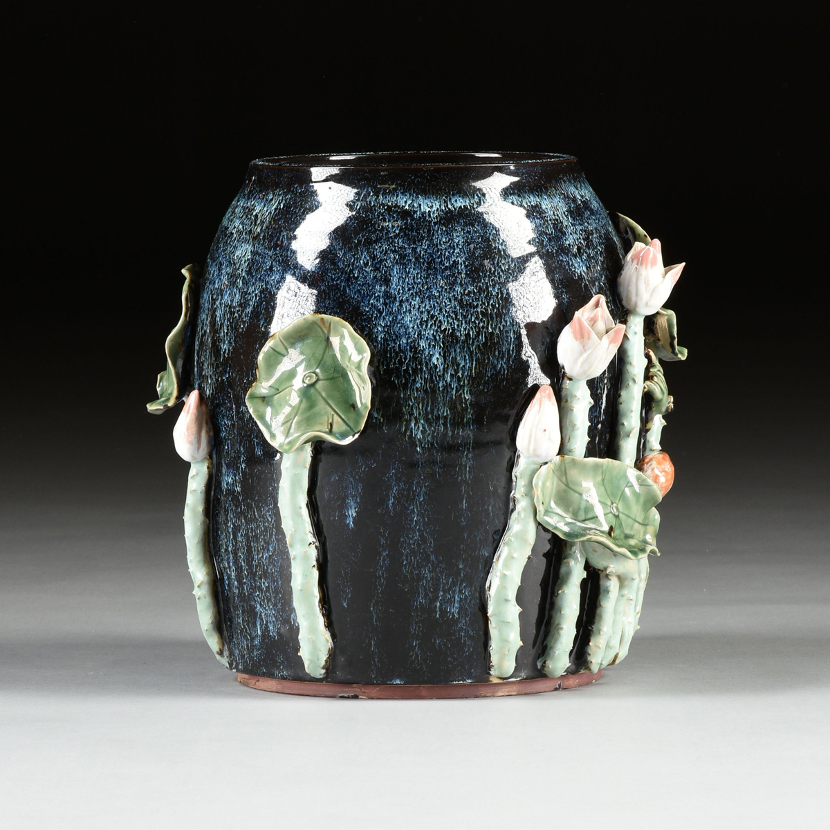 A PAIR OF CHINESE EXPORT RELIEF MOLDED LOTUS AND LEAF GLAZED EARTHENWARE JARDINIÈRES, MODERN, - Image 6 of 9