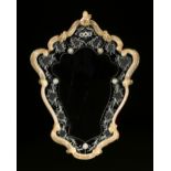 A VENETIAN ROCOCO STYLE GILT AND CLEAR GLASS MOUNTED ETCHED MIRROR, EARLY 20TH CENTURY, the arched