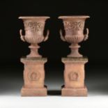 A PAIR OF VICTORIAN CAST IRON URN JARDINIÈRES AND STANDS, LATE 19TH/EARLY 20TH, each with a flaring