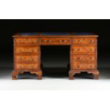 A GEORGE II STYLE WALNUT BLUE LEATHER TOP PARTNER'S DESK, ENGLISH, MID 20TH CENTURY, modeled after