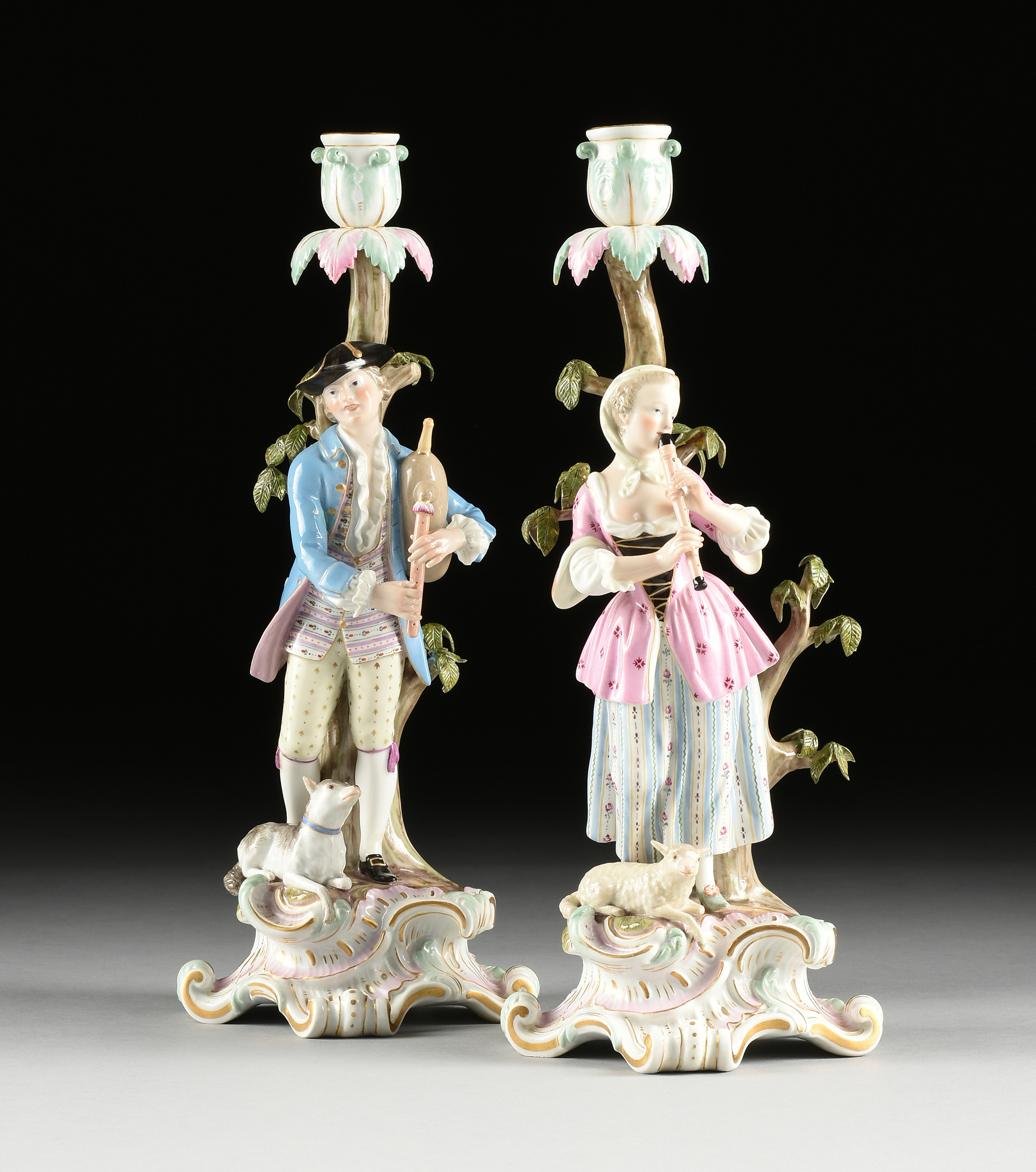 A PAIR OF MEISSEN MUSICIAN FIGURAL CANDLESTICKS, MARKED, LATE 19TH/EARLY 20TH CENTURY, each