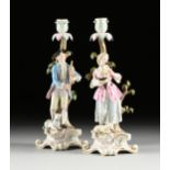 A PAIR OF MEISSEN MUSICIAN FIGURAL CANDLESTICKS, MARKED, LATE 19TH/EARLY 20TH CENTURY, each