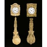 A GROUP OF TWO COMTOISE MORBIER GILT PRESSED BRASS WALL CLOCKS, SIGNED, LATE 19TH CENTURY, one