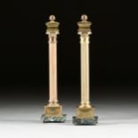 A PAIR OF NEOCLASSICAL REVIVAL GILT BRASS ON MARBLE LAMPS, BY CHAPMAN, 1984, ball finials surmount a