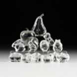 A GROUP OF TWELVE STEUBEN GLASS HAND COOLERS, A PEAR PAPER WEIGHT AND A BACCARAT APPLE, LATE 20TH