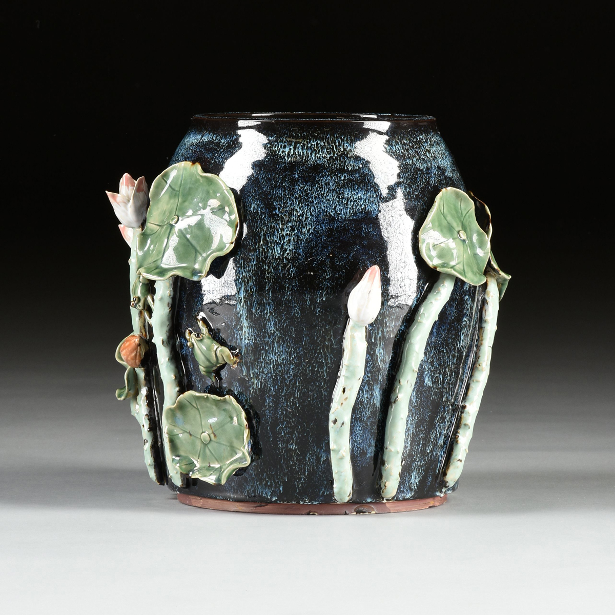 A PAIR OF CHINESE EXPORT RELIEF MOLDED LOTUS AND LEAF GLAZED EARTHENWARE JARDINIÈRES, MODERN, - Image 8 of 9