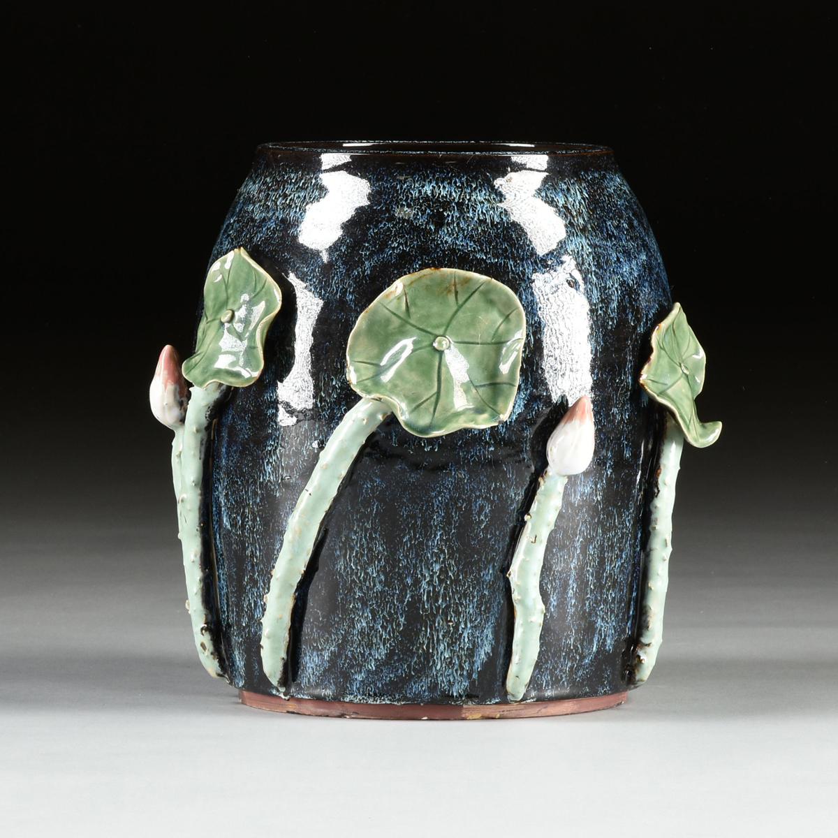 A PAIR OF CHINESE EXPORT RELIEF MOLDED LOTUS AND LEAF GLAZED EARTHENWARE JARDINIÈRES, MODERN, - Image 7 of 9