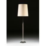 A CONTEMPORARY POLISHED CHROME FLOOR LAMP, MODERN, with a cylindrical rod form standard centering