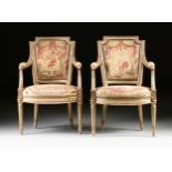 A PAIR OF LOUIS XVI STYLE AUBUSSON UPHOLSTERED PARCEL GILT AND GRAY LACQUERED FAUTEUILS EN