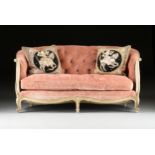 A ROCOCO REVIVAL PINK VELVET UPHOLSTERED PAINTED WOOD CANAPÉ, MID 20TH CENTURY, the curved back