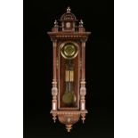 AN ANTIQUE BRONZE MOUNTED WALNUT REGULATOR WALL CLOCK, POSSIBLY AUSTRIAN, CIRCA 1890, the arched