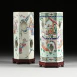 A MATCHED PAIR OF CHINESE FAMILLE ROSE PORCELAIN HEXAGONAL HAT STANDS, each with sides enclosing