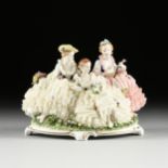 A GERMAN PORCELAIN LACE FIGURAL GROUP, UNTERWEIÃŸBACH, 1958-1976, hand painted porcelain, verso a