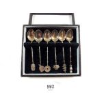 A set of six Asian 950 silver coffee spoons with motif terminals