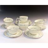 A Royal Worcester tea set in the Bridal Wreath pattern, consisting of six trios, one cake plate,