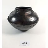 A native North American Navajo pottery vase signed Dora Corona 12cm