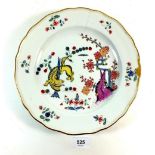 A Meissen plate painted yellow tiger in the Kakiemon style, repaired