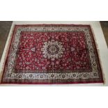 A red ground Kashmir style rug with Sharbas medallion design, 232cm x 158cm