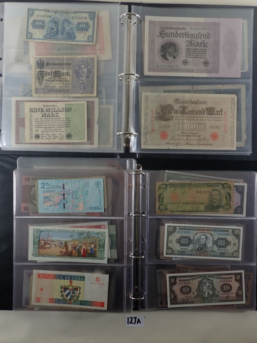 A quantity of World banknotes in albums (2) including: Album (A) German notes circa 1920, (23).