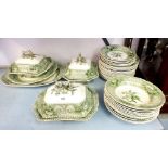 A Victorian Copeland Garrett green printed dinner service comprising seventeen dinner plates, six