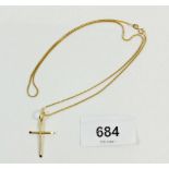A 14ct gold chain and crucifix, 3g