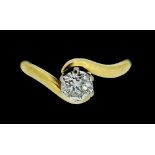 An 18 carat gold crossover set solitaire diamond ring, (approx 60/70 pts), size O to P