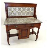 An Edwardian tile back and marble topped washstand