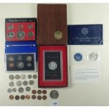 A quantity of USA coinage including: cents, quarters etc, loose plus proof sets 1983 & 1975, unc