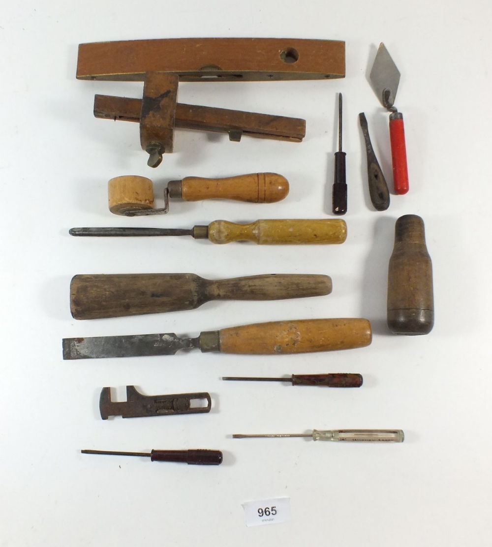 A small selection of various vintage wooden handled and other tools