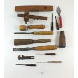 A small selection of various vintage wooden handled and other tools