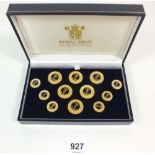 A box of Royal Mint Naval buttons with fitted case