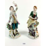 A pair of 19thC porcelain figurines with gold anchor marks to rear, possibly Samson of Paris. 26.5cm