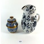 A miniature Moroccan pottery butter pot and a Turkish Kutahaya jug