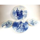 Two pairs of Delft style wall plaques, largest 39cm diameter