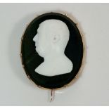 A Tassie style cameo in gold frame (unmarked) depicting Roman emperor c1800, 2.7 x 2.2cm