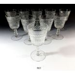 Nine cut glass large wine glasses with leaf borders, 16cm