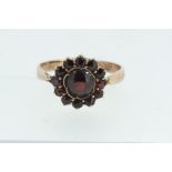 A Victorian 14ct gold garnet cluster ring (not marked) - size J